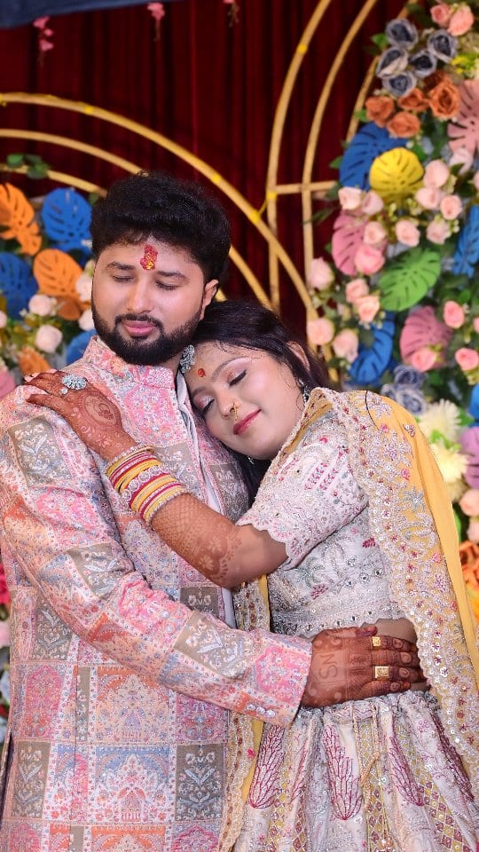 Engagement couple embrace